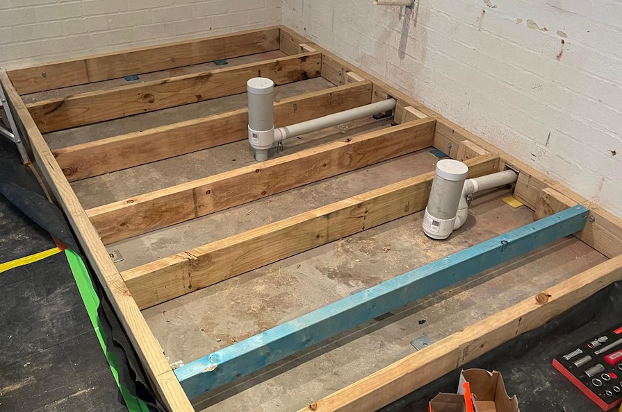 Home renovations Peakhurst — new timber floor joists and bearers with plumbing rough-in during a renovation